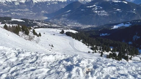 Wide panoramic view of a snow-covered alpine landscape above Passy and Chamonix Stock Footage 346677473