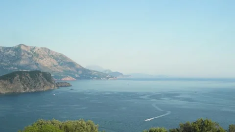 Wide panoramic view of St. Nicholas Island and Budva Bay in Montenegro duri.. Stock Footage 341867863