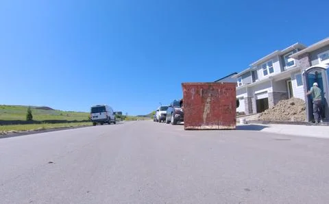 Wide paved road with construction elements Stock Photos