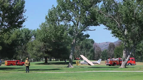 WIDE PLANE CRASHES ON GOLF COURSE Stock-Footage 22952494