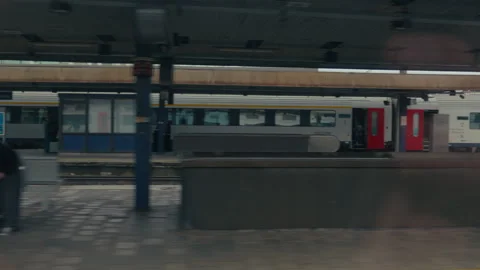 Wide platform with travellers at Antwerp Central Station, Belgium Stock Footage 338324869
