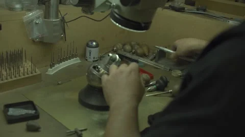 WIDE Prepping ring to be put into cut for gems Stock Footage 253295935