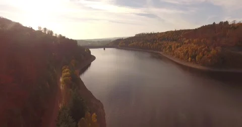 Wide Reservoir Panorama With Distant Bridge, Calm Autumn Valley, Drone View Stock Footage 340361204