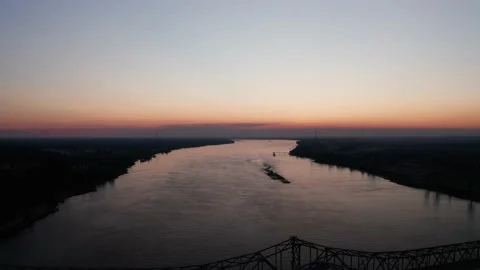 Wide reverse pullback aerial shot of the Natchez-Vidalia bridge on the Stock Footage 202262637