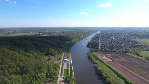 A wide river among the fields Video stock 83341244