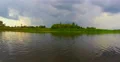 Wide river, countryside. Nature before storm, rapid motion 4k or 4k+ Resolution