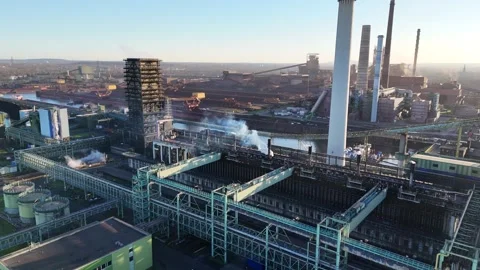 Wide river parallel with smoking coking complex Video stock 331203911