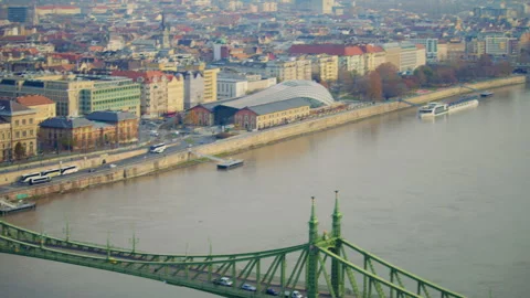 Wide river view flowing through Budapest with bridges and urban skyline Stock Footage 326065765