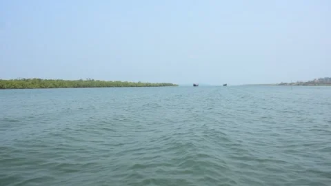 Wide River View from Midstream with Distant Shoreline Stock Footage 331703309