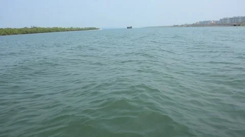 Wide River View from Midstream with Distant Shoreline Stock Footage 331703322