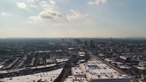Wide Rotating Drone View of Queens Industrial Blocks in Winter Stock Footage 345614999
