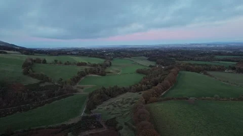 Wide Rural Landscape Under Cloudy Evening Sky Stock Footage 327820120