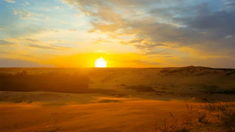 Wide sandy desert at the dramatic sunset time lapse scene Stock Footage 237693192