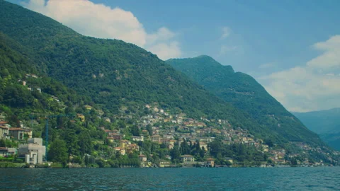 Wide scenic view of Lake Como with mountains, blue water, and peaceful Stock Footage 325545501