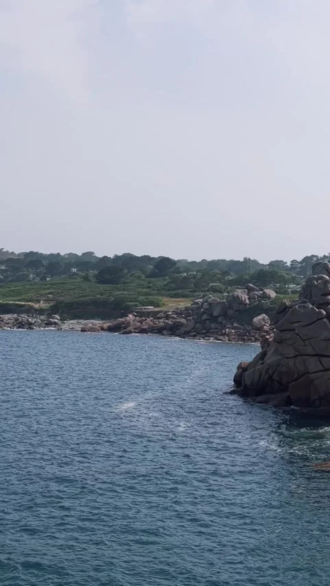 Wide scenic view of the rugged coastline along the Sentier des Douaniers in Stock Footage 346663465