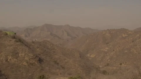 Wide Scenic View of Rugged Hills and Mountains Near Great Wall Jinshanling Stock Footage 345679084