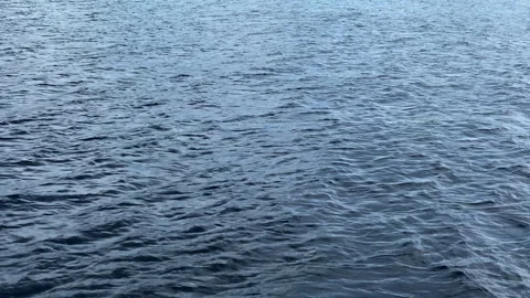 A wide sea with small waves flowing Stock Footage 276177907