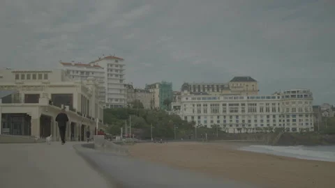 Wide seafront shot city background beach right Vídeo Stock 342925448