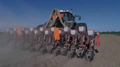 Wide seeding machine at work on a minimum tillage field. travelling shot Stock Footage 113291223