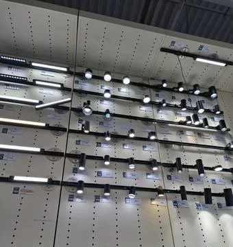 A wide selection of modern track lighting fixtures and spotlights is showcas Stock-Fotos
