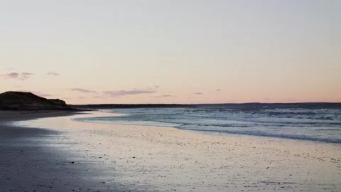 Wide shot of beach at sunset Stock Footage 220568915