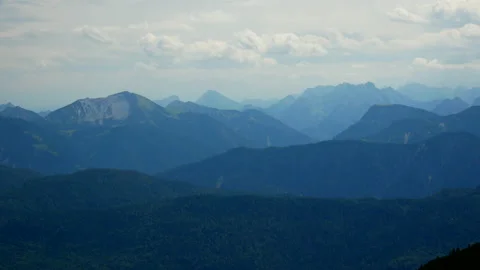 Wide shot of beautiful mountain range during cloudy day.Silhouette of german alp Video stock 139607422