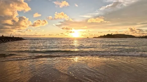 Wide shot of beautiful sunset over Indian Ocean with cliffs in Sri Lanka Stock Footage 339903259