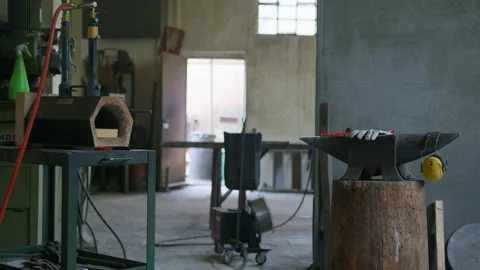 Wide Shot of Blacksmith Workshop – Anvil and Forge in Static Frame Stock Footage 313851221