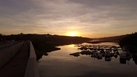 Wide shot of boat marina at sunset Stock Footage