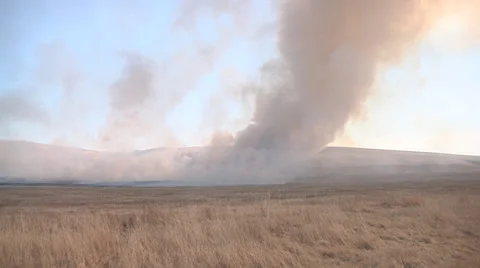 Wide shot of burning field Stock Footage 37777771
