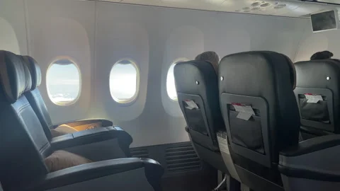 Wide shot of business class cabin of a Turkish Airlines flight Stock Footage 317238724