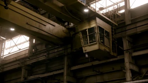 Wide Shot of Cabin of Steel Mill Crane - Static Stock Footage 89944531