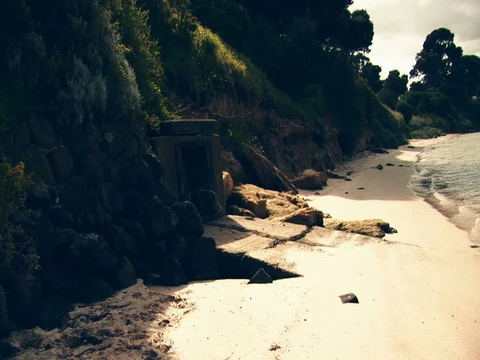Wide shot of a cave hole, beach. Stock Footage 79979788