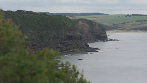 Wide shot of cliffs on the coastline Stock Footage 295080055