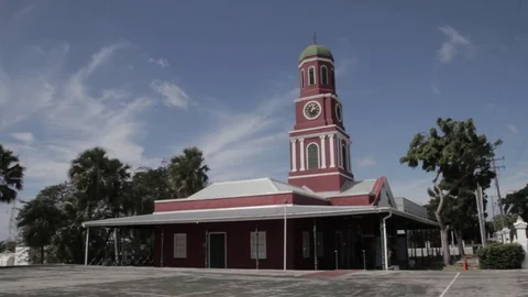 Wide Shot of Clock tower at the Garrison Savannah in Barbados Stock Footage 72472146