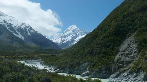 Wide shot of clouds moving in toward Mount Cook Stock Footage 260370700
