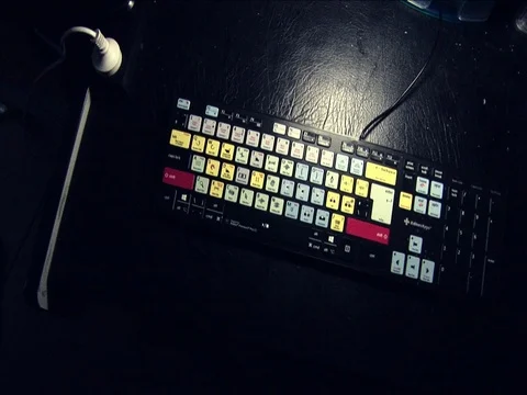 Wide shot of a computer keyboard. Stock Footage 80013911