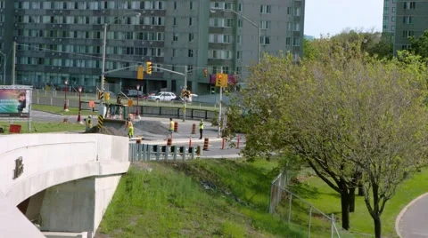 Wide shot-construction workers using two backhoes Stock Footage 67423207