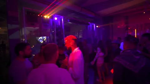 Wide Shot of Crowd Dancing at Electronic Music Club Damaria Bali 4K Video stock 335138545