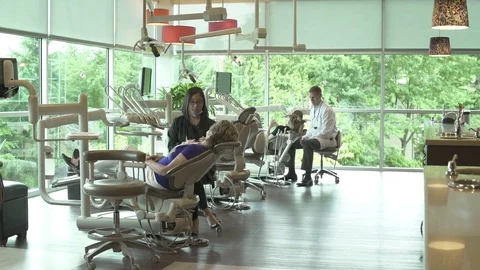 Wide shot of a dentist at work 스톡 동영상 76217452