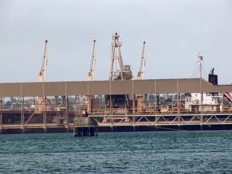 Wide shot of a dock on the ocean. Stock Footage 79984980