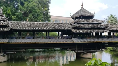 Wide Shot of Dong Ethnic Wind and Rain Bridge in Guangxi, China Stock Footage 334225035