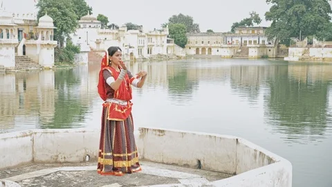 A wide shot of an elegant Indian classical dancer Stock-Footage 96364458