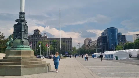 Wide shot of the Glavna Pošta (Main Post Office) and the temporary tents set up 스톡 동영상 309087226