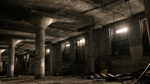 Wide shot of graffiti pillars in abandoned building handheld pan left Stock Footage 89944905