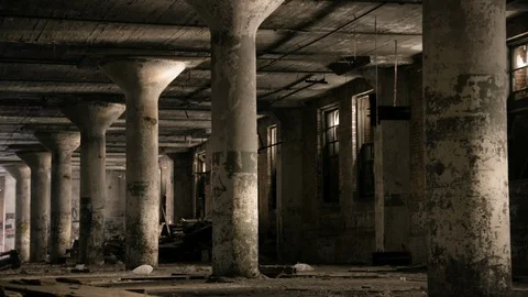 Wide shot of graffiti pillars in abandoned building handheld Stock Footage 89944908