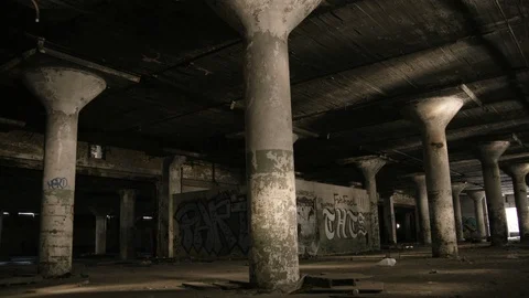 Wide shot of graffiti pillars handheld tighter on gang graffiti Stock Footage 89944903