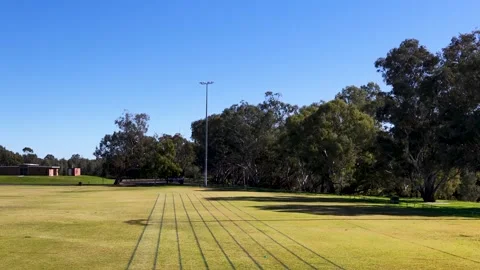 Wide Shot of Grass Running Track and Athletic Field Stock Footage 340881457