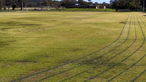 Wide Shot of Grass Running Track and Athletic Field Stock Footage 341315870