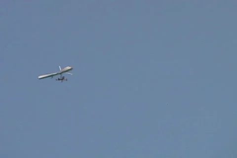 Wide Shot of Hang Glider Flight Flying Exits Frame Aerial Stock Footage 145127